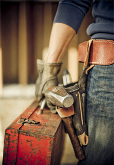 Commercial General Contractor carrying tools.