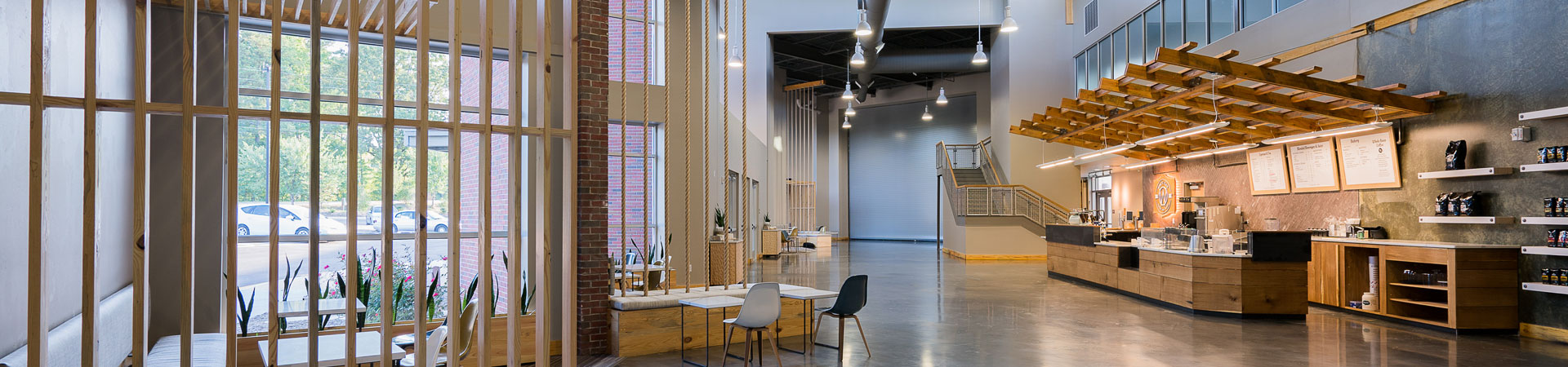 Interior shot of a completed modern building with beautiful windows managed by Aspire.